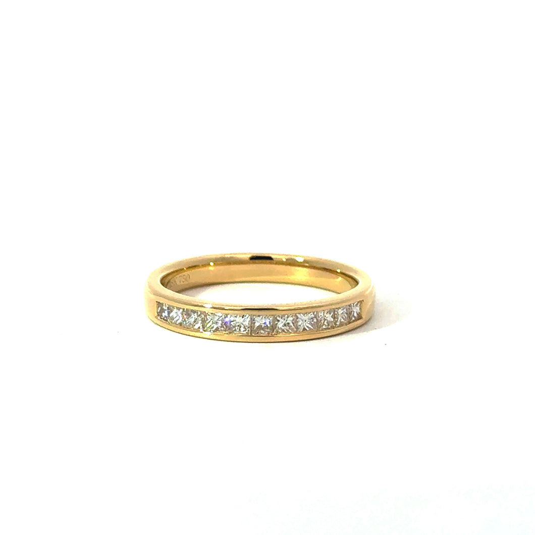 Yellow gold channel set ring